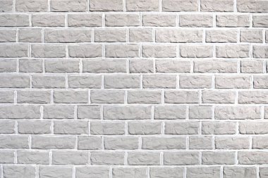 Gri tuğla duvarın soyut arka planı. Modern yüzeyler tavan arası tarzı