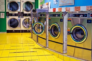 laundry with washing machines and dryers in Venice on October 11, 2024 clipart