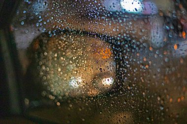 side mirror in raindrops while driving. Poor visibility. traffic safet clipart