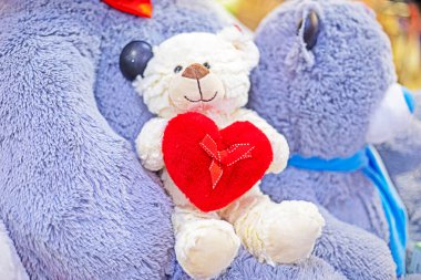 cute teddy bear with a heart in the middle in the interior. valentine's day clipart