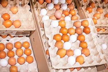 fresh farm chicken eggs in the supermarket. Economic crisis and default