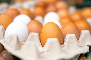 fresh farm chicken eggs in the supermarket. Economic crisis and default