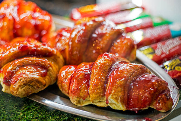 Sweet hot croissants with fruit jam. Morning snack.