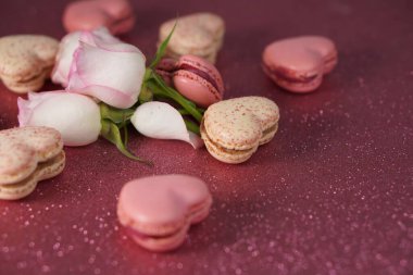 Romantic composition for Valentines Day, engagement ring, heart-shaped macarons