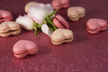 Romantic composition for Valentines Day, engagement ring, heart-shaped macarons