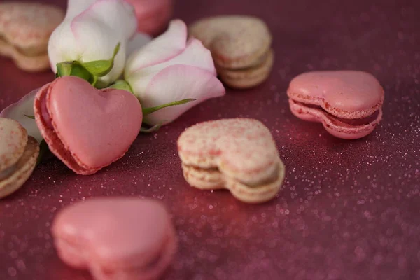 Romantic composition for Valentines Day, engagement ring, heart-shaped macarons