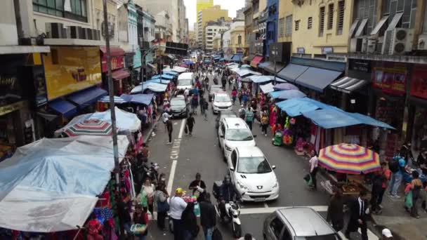 サンパウロブラジル2022年12月21日ルア25デ マロ中心街の人気ショッピングエリアでの消費者の動きだからパウロ — ストック動画