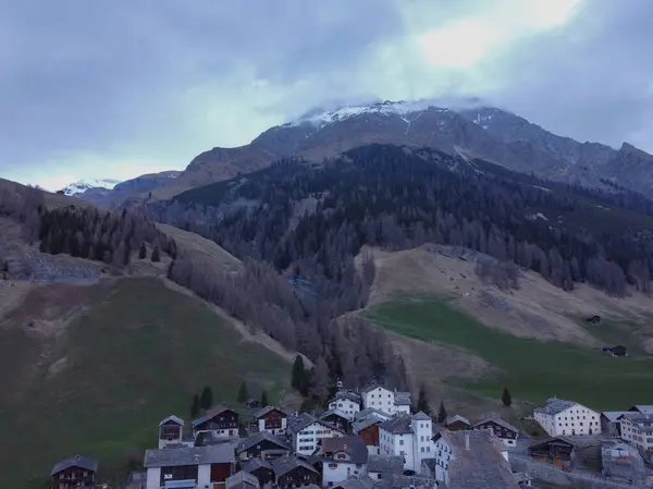 stock image Mountain with snow, on top of a mountain. Forest with the city. Alps, Austria, walking. High quality photo