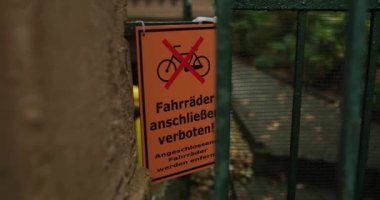 German no bikes allowed warning sign in residential area, fall season. High quality 4k footage