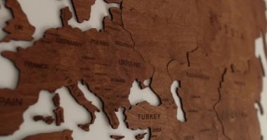 Vintage wooden world map in modern room elegant interior design 4k footage. High quality 4k footage