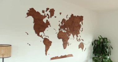 Wood world map, modern room, white wall, vintage decoration living room. High quality 4k footage