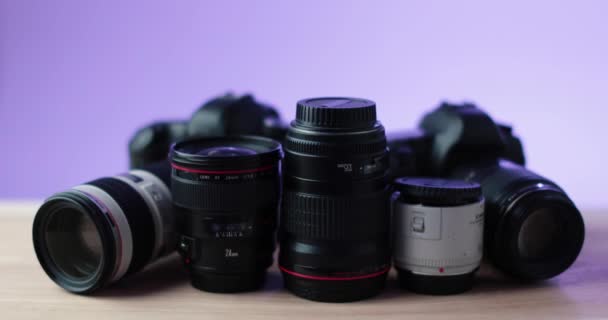Camera Photo Lense Camera Equipment Purple Background Studio High Quality — Stock Video