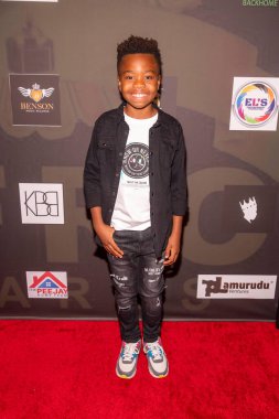 Masum Ekakitie, 6 Kasım 2022 'de Los Angeles' ta düzenlenen Regal LA Live 'da 2022 Afro Ödülleri' ne katıldı. 