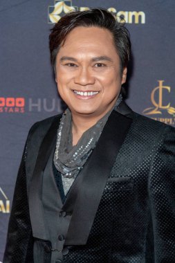 Kevin Khoa, 1 Aralık 2022 'de QD Meydanı, Westminster' da SAM Vakfı 15. yıl dönümü yardım galasına katılıyor. 