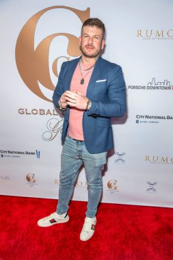 DJ Bander attends 2023 Inaugural Preview and Global Couture Gala at Porsche DTLA, Los Angeles, CA January 22 2023