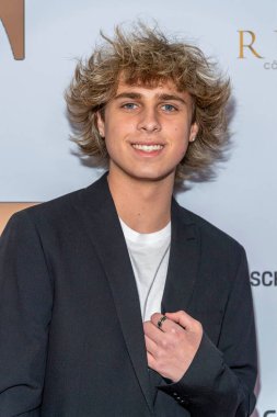 Singer Nicholas Gordon attends 2023 Inaugural Preview and Global Couture Gala at Porsche DTLA, Los Angeles, CA January 22 2023