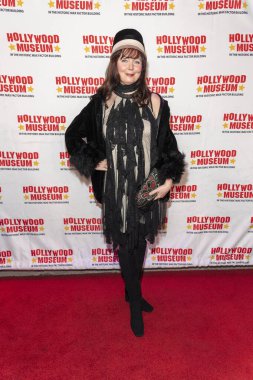 Comedian Dee Dee Sorvino attends The Hollywood Museum Unveiling Of Film Legend Mary Pickford's Ball Gown at The Hollywood Museum, Los Angeles, CA March 4, 2023
