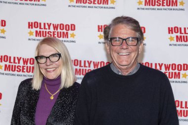 Actor Anson Williams with guest attends The Hollywood Museum Unveiling Of Film Legend Mary Pickford's Ball Gown at The Hollywood Museum, Los Angeles, CA March 4, 2023