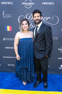 Associate director Emily Uyeda Kantrim, Deputy Fernando Morales attend Black-Tie Dinner Party In Honor of Her Excellency Kitoko Gata Ngoulou, Ambassador of Chad at home of Phil Westbrooks, Los Angeles, CA July 21, 2023