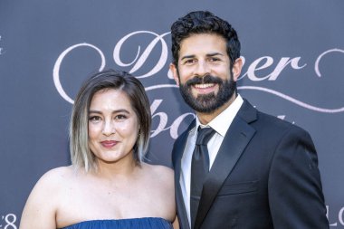 Associate director Emily Uyeda Kantrim, Deputy Fernando Morales attend Black-Tie Dinner Party In Honor of Her Excellency Kitoko Gata Ngoulou, Ambassador of Chad at home of Phil Westbrooks, Los Angeles, CA July 21, 2023