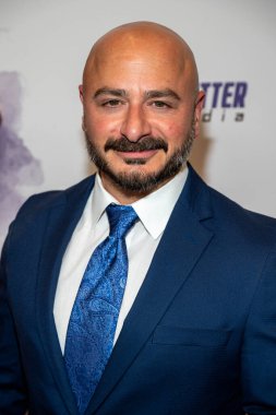 Aktör ve yardımcı yapımcı Bert Rotundo, 9 Kasım 2023 'te Westwood, Los Angeles' taki Regency Village Theatre 'da Çıplak Şemsiye Maceraları' nın dünya prömiyerine katıldı.