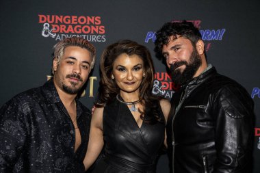 Actor Christian Navarro, Actress Anjali Bhimani, Actor Luis Carazo attend Dungeons and Dragons Adventures screening event at E.P. and L.P. rooftop, Los Angeles, CA November 13, 2023 clipart