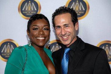 Şarkıcı Brendalynn McKinney, besteci David Majzlin 15 Kasım 2023 'te Avalon Hollywood, Los Angeles' ta düzenlenen Medya Ödülleri 'nde 14. Hollywood Müzik' e katıldı.