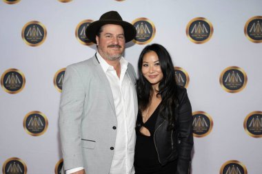 Tiffany Park ile birlikte film bestecisi H Scott Salinas, 15 Kasım 2023 'te Avalon Hollywood, Los Angeles' ta düzenlenen Medya Ödülleri 'nde 14. Hollywood Müzik' e katıldı.