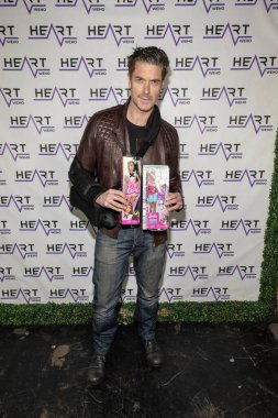 Actor Jed Bernard attends J. Michael Arnoldi Birthday Bash and Toy Drive featuring Performance of G Tom Mac at Heart WeHo Night club in West Hollywood, Los Angeles, CA December 9, 2023 clipart