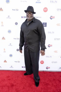 Komedyen Big Lou, Earvin Magic Johnson Park & Community Event Center, Los Angeles, CA, 9 Mart 2024 'te düzenlenen 2024 Mezuniyet ve Moda Fuarı' na katıldı.