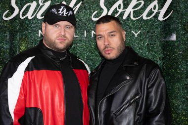 Designer Adolfo Sanchez (R) attends Image Fashion week inaugural show with Sarah Sokol  at Neuehouse Hollywood, Los Angeles, CA, October 10th, 2024 clipart