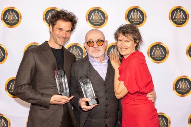 Musicians Clment Ducol, Musicians Bernie Taupin, Camille attend 2024 The Hollywood Music In Media Awards at AVALON Hollywood and Bardot, Los Angeles, CA, November 20th, 2024 clipart