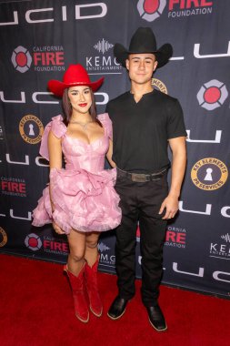 Aktris / Müzisyen Izabellah Rae Diez, Aktör / Müzisyen Rex James IV Lucid Motor, Los Angeles, CA, 19 Ocak 2025 'te Kaliforniya Yangın Vakfı için düzenlenen ön eleme ve bağış etkinliğine katıldı.