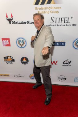 Eski kickboks dünya şampiyonu Gerry Blanck, 20 Temmuz 2025 'te Santa Monica Bay Kadınlar Kulübü' nde Palisades Dolphin Strong Benefit konserine katıldı.