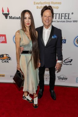 Legacy Entertainment Lily ve Steven Moore 20 Temmuz 2025 'te Santa Monica Bay Woman' s Club, Los Angeles 'taki Palisades Dolphin Strong Benefit konserine katıldılar.