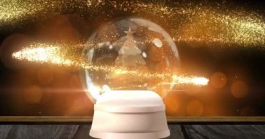 Noellerin kar küresinin benekler üzerinde canlandırılması. Noel, gelenek ve dijital arayüz kavramı dijital olarak oluşturuldu.