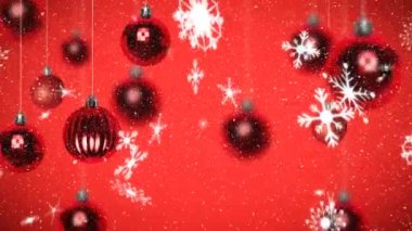 Kırmızı arka planda, Noel süslerinin üzerine düşen kar animasyonu. Noel geleneği ve kutlama konsepti dijital olarak oluşturulmuş video.