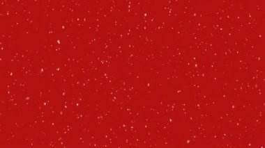 Kırmızı arkaplanda yağan kar animasyonu. Noel geleneği ve kutlama konsepti dijital olarak oluşturulmuş video.