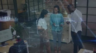 Animation of data processing over diverse business people in office. Global business and digital interface concept digitally generated video.