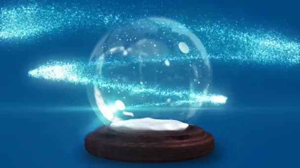 Sprankelend Licht Beweegt Spiraalvormig Rond Sneeuwbol Tegen Blauwe Achtergrond — Stockvideo