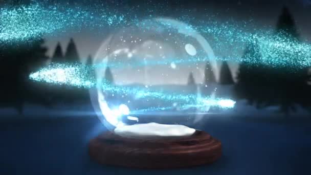 Berkilau Cahaya Spiral Bergerak Sekitar Bola Salju Pada Lanskap Bersalju — Stok Video