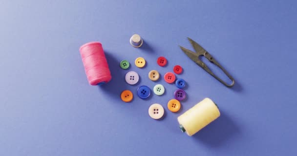 Video Thread Snippers Thimble Buttons Reels Cotton Blue Background Sewing — Stock Video
