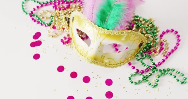 Video Masquerade Mask Feathers Mardi Gras Beads Confetti White Background — Stock Video