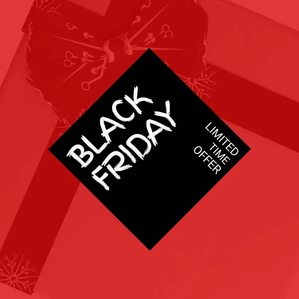 赤のプレゼントリボンの上に黒の金曜日のテキストの構成 黒の金曜日 クリスマスショッピング 販売と小売コンセプトデジタル生成された画像 — ストック写真