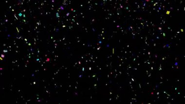 Siyah arkaplandan düşen renkli konfeti animasyonu. Yeni yıl arifesi ve dijital olarak üretilen video konsepti.