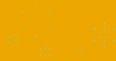 Turuncu arka planda yeşil havai fişek animasyonu. Yeni yıl, gelenek ve kutlama konsepti dijital olarak oluşturuldu.