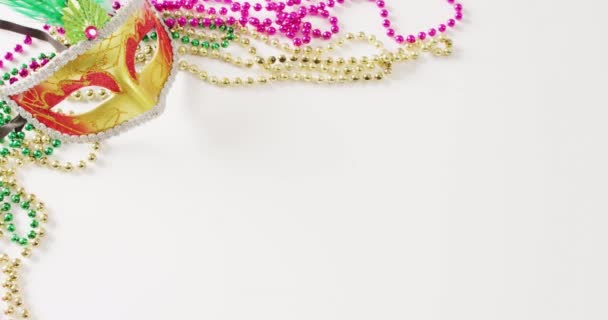 Video Gold Masquerade Mask Mardi Gras Beads White Background Copy — Stock Video