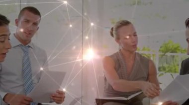 Animation of network of connections over caucasian business people in office. Global business and digital interface concept digitally generated video.