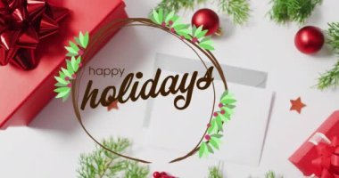 Yılbaşı süslemeleri ve zarfları üzerine Mutlu Noeller mesajları. Noel, gelenek ve kutlama konsepti dijital olarak oluşturuldu.