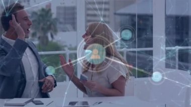 Animation of network of connections over caucasian business people in office. Global business and digital interface concept digitally generated video.